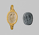 Steatite scaraboid seal set in a gold swivel ring, Steatite, gold, Greek