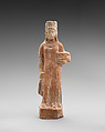 Terracotta figurine of a standing female votary holding a box, Terracotta, Cypriot