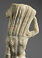 Marble statue of Pan/ Pan or Satyr with winnowing basket filled with offerings and cultic objects, Marble