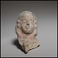 Female head, perhaps from a standing tambourine player, Terracotta, Cypriot