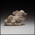 Terracotta statuette of Eros banqueting, Terracotta, Cypriot