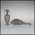 Glass bottle in the shape of a fish, Glass, Roman