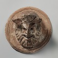Terracotta roundel with mask of Pan, Terracotta, Greek