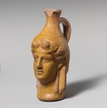 Terracotta jug in the form of Dionysos, Terracotta, Greek or Roman