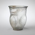 Glass beaker with indented sides, Glass, Roman