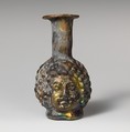 Glass double head-shaped bottle, Glass, Roman, Syrian