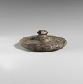 Stone lid of a pyxis, Serpentine, Minoan