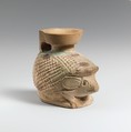 Faience aryballos (oil flask) in the form of a hedgehog, Faience, East Greek