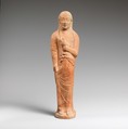 Terracotta statuette of a woman holding a bird, Terracotta, East Greek
