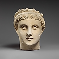 Limestone head of a wreathed youth, Limestone, Cypriot