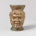 Glass cup in the shape of a Black African's head, Glass, Roman
