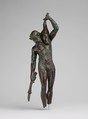 Bronze statuette of a satyr with a torch and wineskin, Bronze, Greek