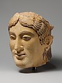 Terracotta head of a woman, probably a sphinx, Terracotta, Greek