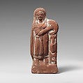 Terracotta statuette of a woman with tympanum, Terracotta, Roman, Egyptian