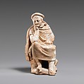 Terracotta statuette of a youth seated on a rock, Terracotta, Greek, Boeotian