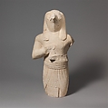 Limestone statuette of a male figure with Egyptianizing features, Limestone, Cypriot