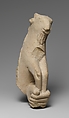 Limestone statue fragment of a left hand holding a kid, Limestone, Cypriot