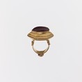 Gold and cabochon garnet ring, Gold and cabochon garnet, Greek