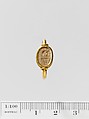Steatite scaraboid seal set in a gold swivel ring, Steatite, gold, Greek
