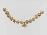 Gilt terracotta ornaments from a necklace, Terracotta, gold, Mycenaean