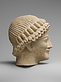 Limestone head of a youth, Limestone, Cypriot