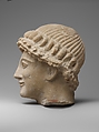 Limestone head of a youth, Limestone, Cypriot