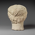 Limestone head of a wreathed youth, Limestone, Cypriot