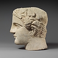 Limestone head of a wreathed youth, Limestone, Cypriot