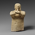 Limestone statuette of a male aulos player, Limestone, Cypriot