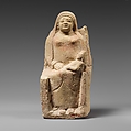 Seated limestone kourotrophos, Limestone, Cypriot