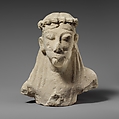 Upper part of a limestone statuette of a male aulos player, Limestone, Cypriot