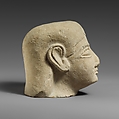 Limestone head of a beardless male with a plain headdress, Limestone, Cypriot