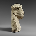 Upper part of a limestone statuette of a male aulos player, Limestone, Cypriot