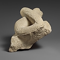 Two fragments of a limestone sarcophagus lid with snakes, Limestone, Cypriot