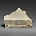 Two fragments of a limestone sarcophagus lid with snakes, Limestone, Cypriot