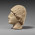 Limestone head of a beardless male votary, Limestone, Cypriot
