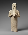 Limestone statuette of a male aulos player, Limestone, Cypriot