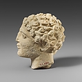 Limestone head of a beardless male votary, Limestone, Cypriot