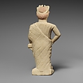 Limestone statuette of a beardless male votary with a wreath of leaves, Limestone, Cypriot