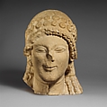 Limestone head of a female votary, Limestone, Cypriot