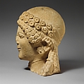 Limestone head of a female votary, Limestone, Cypriot