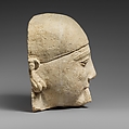 Limestone head of a male aulos player, Limestone, Cypriot