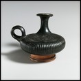 Terracotta guttus (flask with handle and vertical spout), Terracotta, Greek, South Italian, Apulian