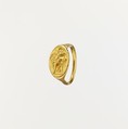Gold ring with intaglio of seated woman and flying Eros, Gold, Greek
