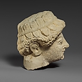 Limestone head with of a beardless male with a wreath of leaves, Limestone, Cypriot