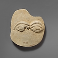 Limestone plaque with two eyes in relief, Limestone, Cypriot