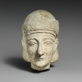 Limestone head of a beardless male with a diadem, Limestone, Cypriot