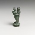 Bronze candelabrum finial showing a man embracing a woman, Bronze, Etruscan