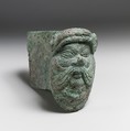 Fragment of a cart or chariot, socket with satyr mask, Bronze, Etruscan