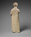 Limestone statuette of a boy with a chain of amulets, Limestone, Cypriot